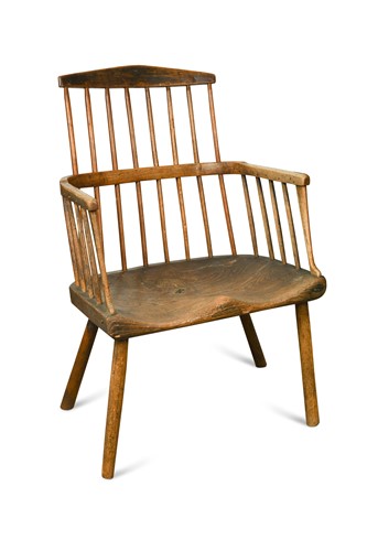 Lot 487 - A primitive comb back armchair, 18th century