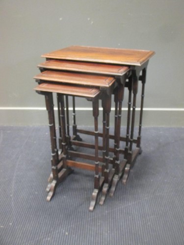 Lot 467 - A nest of mahogany quartetto tables in the...