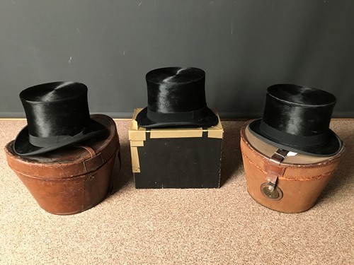 Lot 410 - Three early 20th century top hats