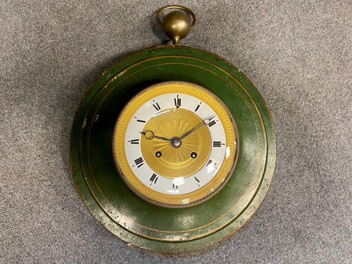 Lot 429 - A French 19th century circular tole case wall clock