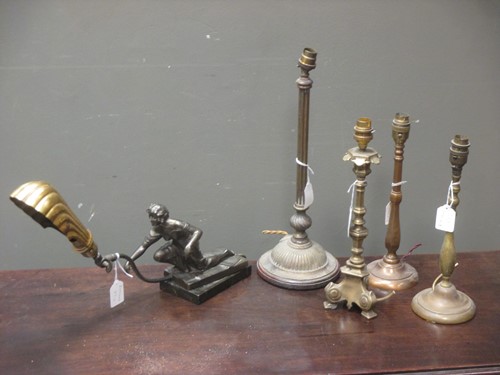 Lot 482 - A bronzed sculptural desk lamp of a woman...