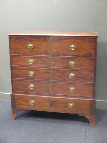 Lot 419 - A 19th century mahogany cupboard on low stand...