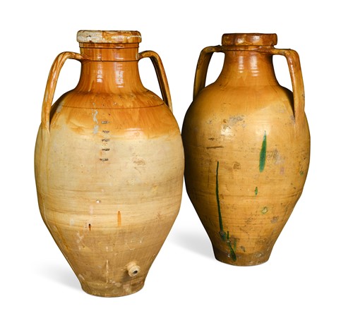Lot 490 - A near pair of large twin-handled ovoid Mediterranean olive jars
