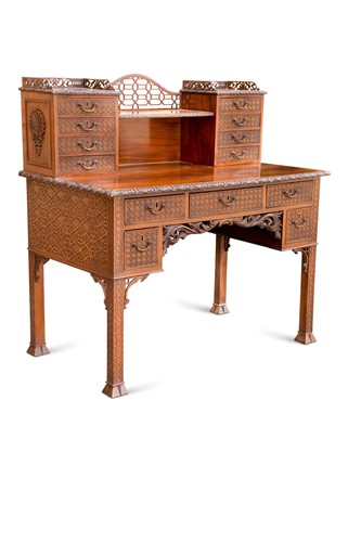 Lot 532 - A mahogany 'Chinese Chippendale' style blind fretwork bonheur du jour, late19th century