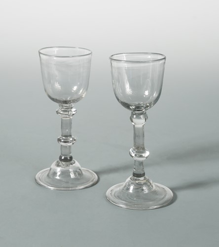 Lot 1 - A pair of George III wine glasses