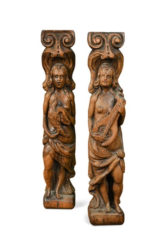 Lot 455 - A pair of carved oak caryatids, probably 17th century