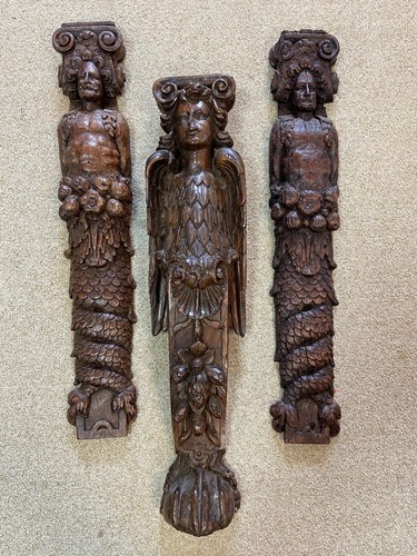 Lot 452 - A pair of carved oak herms, probably 17th century