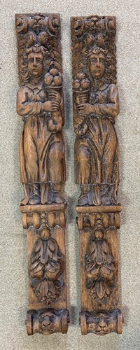 Lot 444 - A large pair of carved oak caryatids, probably late 17th or early 18th century