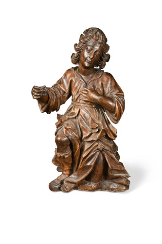 Lot 482 - A carved figure of a kneeling male, probably late 17th or early 18th century