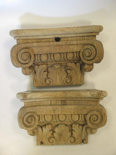 Lot 38 - A pair of oak capitals 16cm high