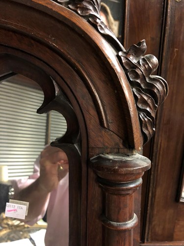 Lot 594 - A pair of carved oak Gothic revivial arched door panels