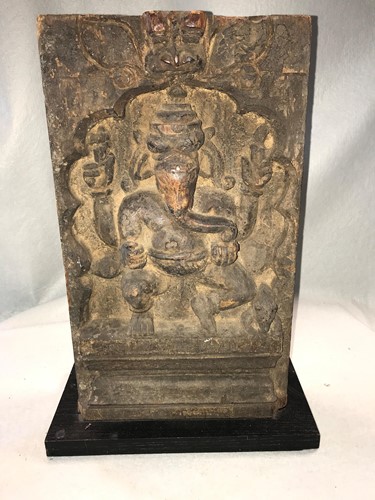 Lot 188 - A mid 19th century Indian carved wood panel of...
