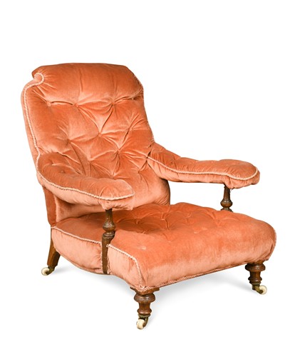 Lot 132 - A late-Victorian walnut library chair in the manner of Shoolbred