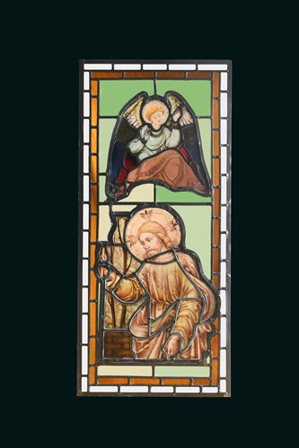 Lot 401 - A 17th or 18th century stained glass panel of an angel