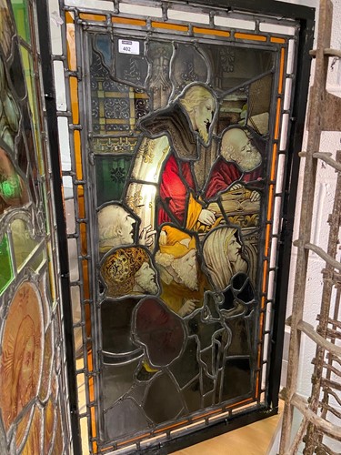 Lot 402 - A Victorian stained glass panel of men attentively listening