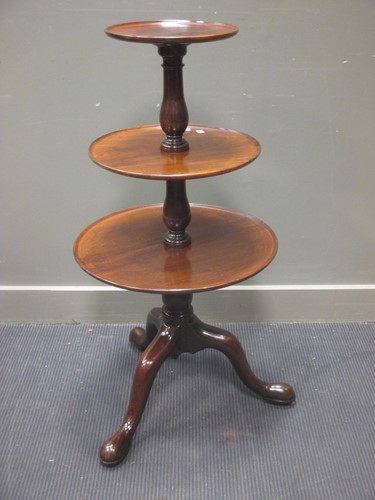 Lot 430 - A George III and later mahogany three tier...