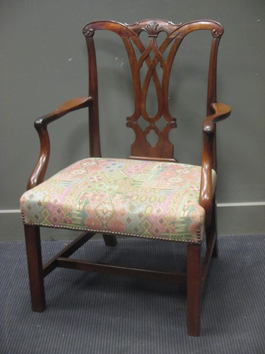 Lot 424 - A George III mahogany elbow chair