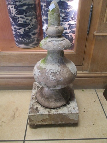 Lot 563 - A terracotta finial 60cm high
