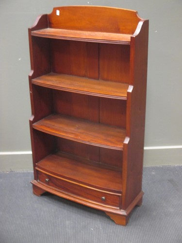 Lot 326 - A mahogany bowfronted waterfall bookcase