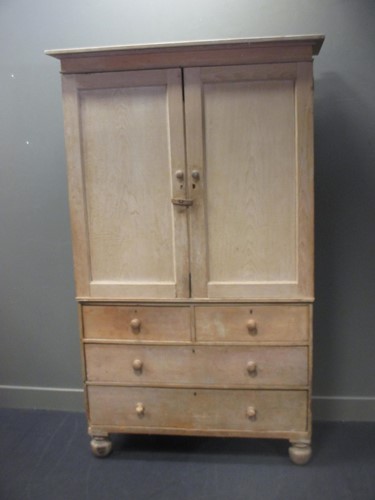 Lot 349 - A large stripped pine press cupboard 210 x 128...