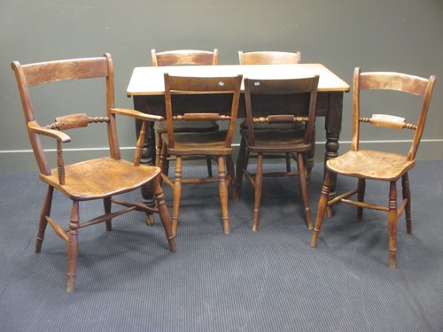 Lot 463 - A set of six (five + one) elm seat chairs...