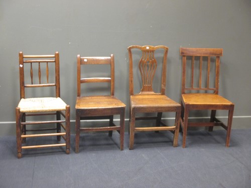 Lot 429 - Three 18th century solid seat dining chairs...