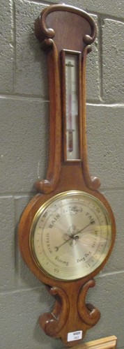 Lot 362 - An early 20th century oak aneroid barometer...