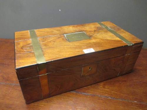 Lot 44 - A Victorian brass bound walnut writing slope