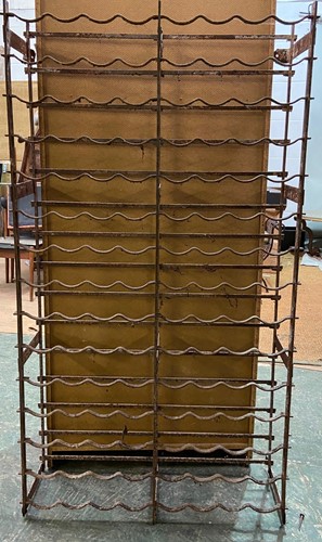 Lot 648 - Two 19th century wrought iron wine racks