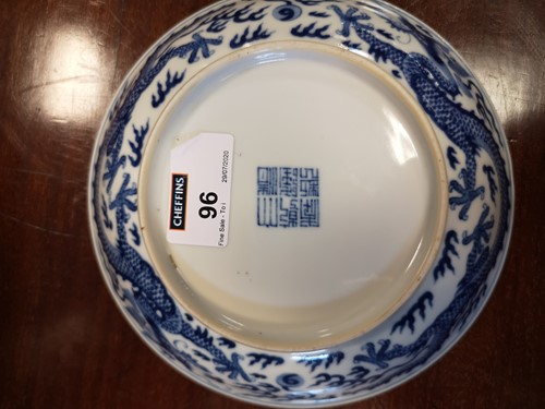 Lot 96 - A Chinese blue and white porcelain dragon dish, Qianlong (1736-1795)