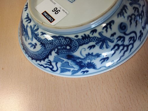Lot 96 - A Chinese blue and white porcelain dragon dish, Qianlong (1736-1795)