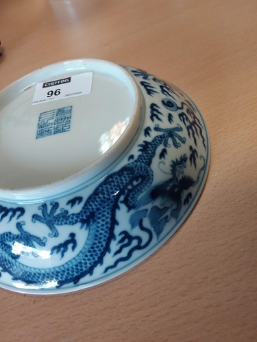 Lot 96 - A Chinese blue and white porcelain dragon dish, Qianlong (1736-1795)