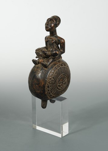 Lot 359 - A Yombe (or Mayombe) carved wood “Dibu”, figural bell