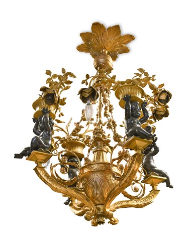 Lot 612 - A gilt-bronze four branch decorated electrolier in the French style