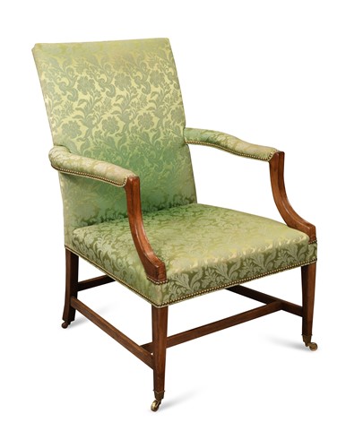 Lot 33 - A George III mahogany Gainsborough library armchair