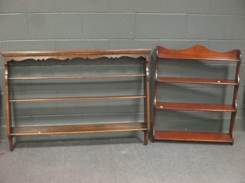 Lot 499 - An oak wall hanging open plate rack, 122cm...