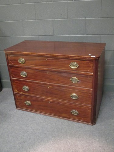 Lot 509 - A George III mahogany chest of four long...