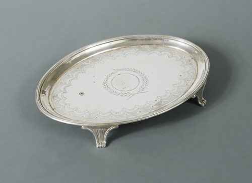 Lot 488 - A George III silver teapot stand