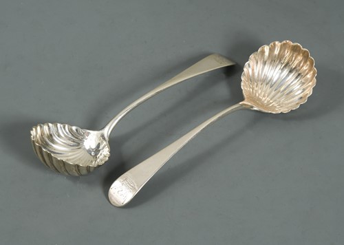 Lot 489 - A pair of George III silver sauce ladles