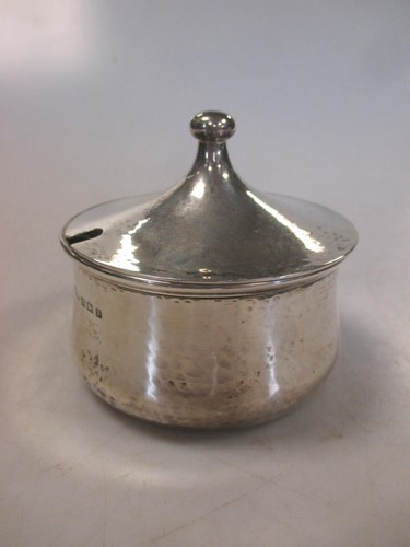 Lot 237 - An A. E. Jones silver preserve jar and cover