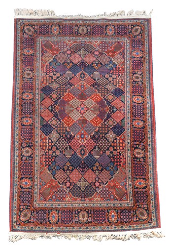 Lot 557 - A finely-woven Kashan rug to a Josheghan design