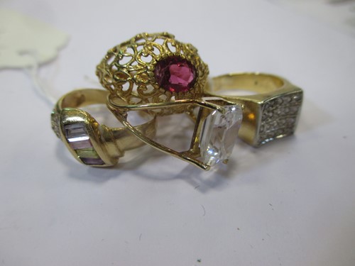 Lot 146 - A collection of four stone set rings, three...