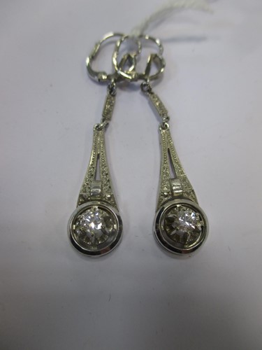 Lot 136 - A pair of diamond set ear pendants stamped '18ct'