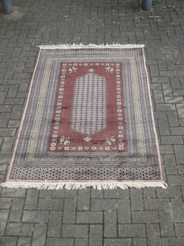 Lot 414 - Four Asian rugs, two probably Pakistan and two...