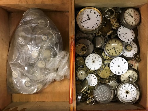 Lot 54 - A cabinet of watchmaker's spare parts, watch...