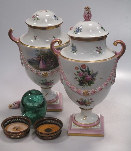 Lot 40 - A pair of Continental urns and covers...