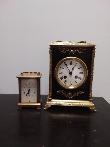Lot 49 - A French late 19th century ebonised and gilt metal mantel clock