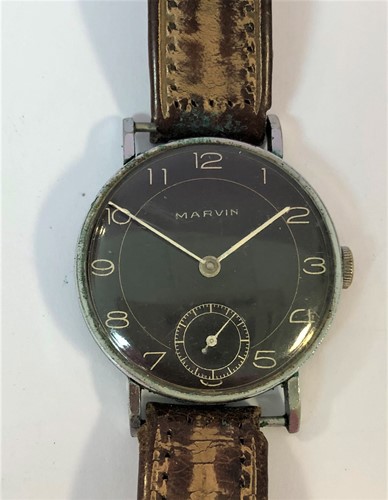 Lot 300 - Marvin - A gentleman's oversized steel wristwatch