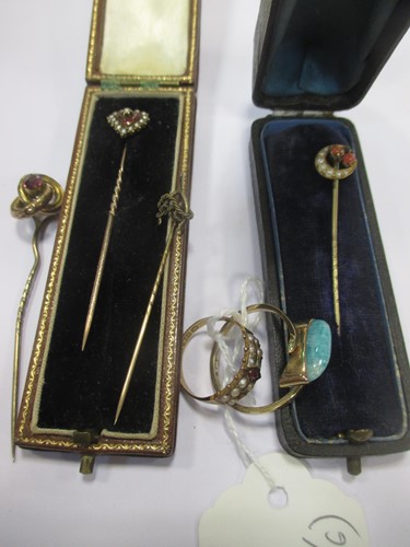 Lot 124 - Three 19th century stick pins, together with a...
