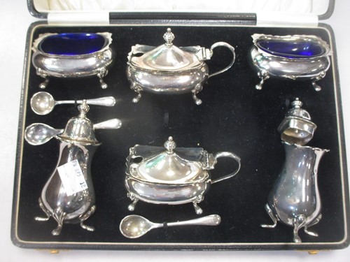 Lot 184 - A silver six piece condiment set in the...